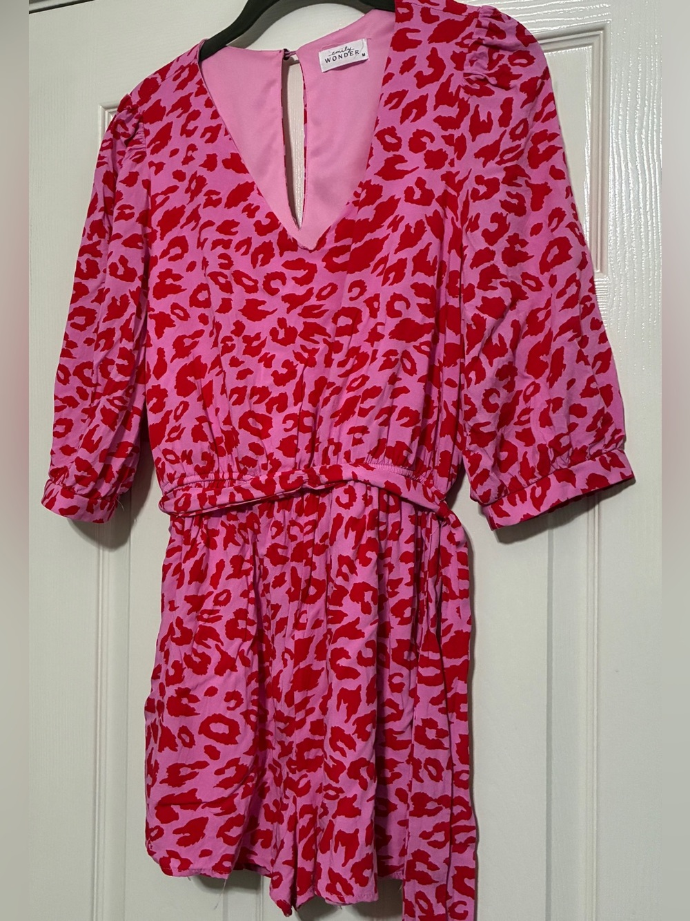 Emily Wonder pink print shorts/jumpsuit Size Medium. Easy pull on, with Sash.